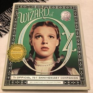75th Anniversary wizard of oz collector book.